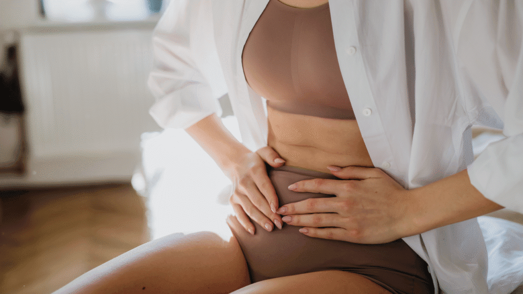 Woman experiencing pelvic discomfort before starting pelvic floor therapy